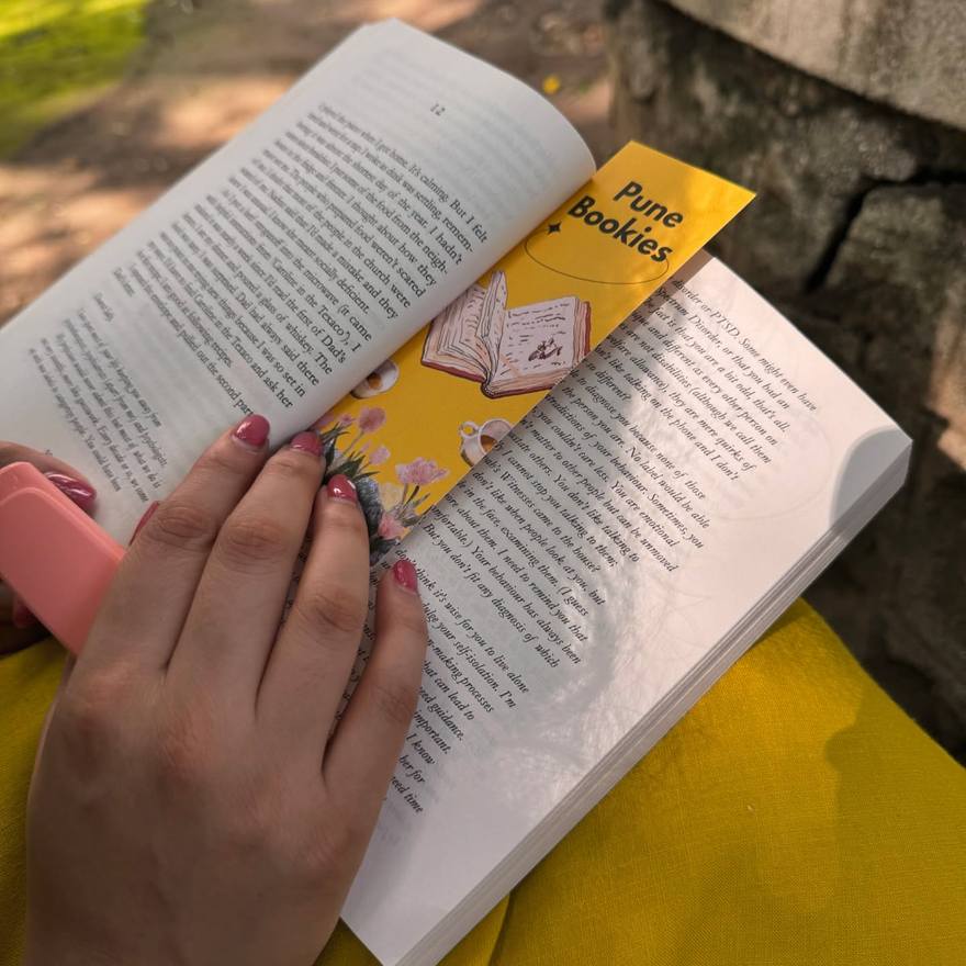 Hands holding an open page