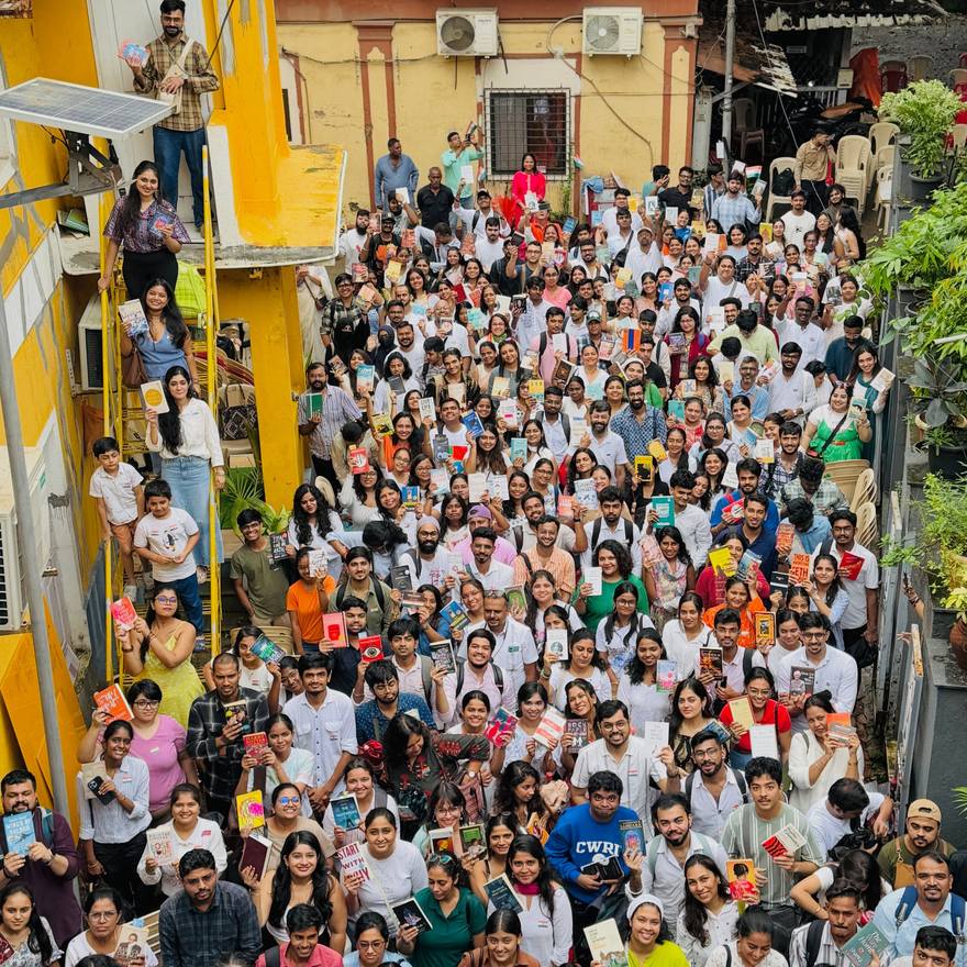 A sitting seen from above, filling a street