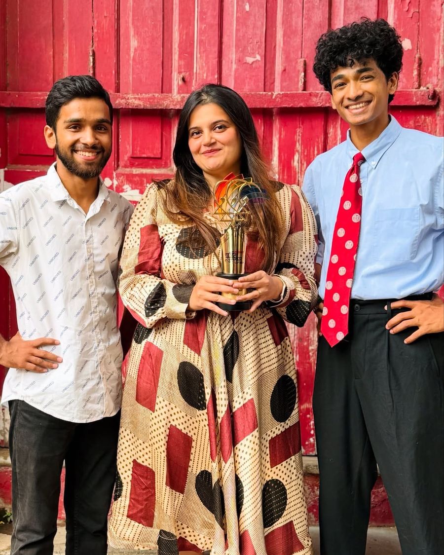 Pritesh Singh, Gargi Sandu and Shantanu Naidu with an award for Mumbai Bookies